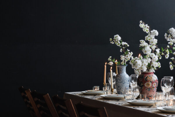 wood folding chair and tall vase centerpiece for wedding